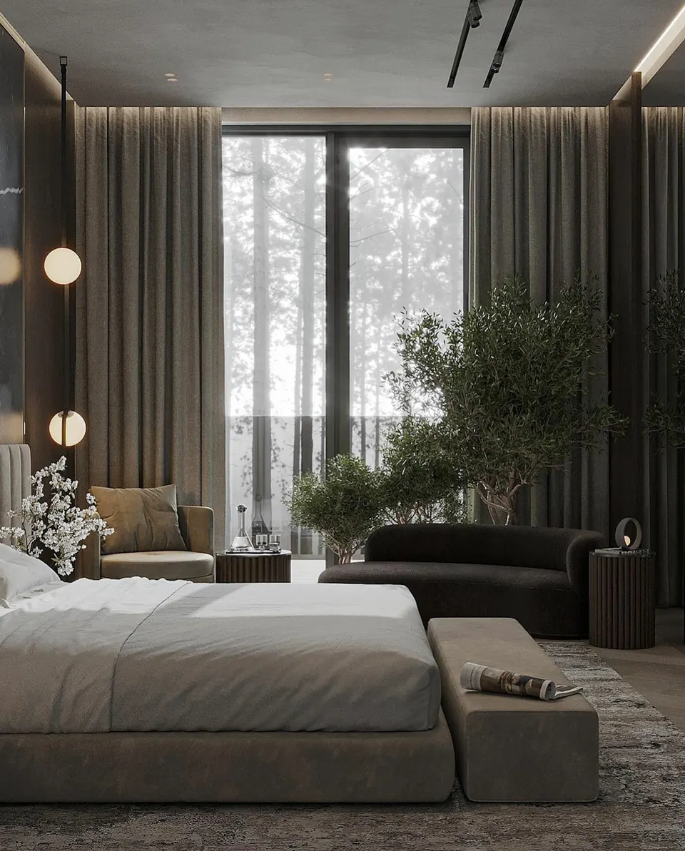 Bedroom with floor-length dark curtains and sheers